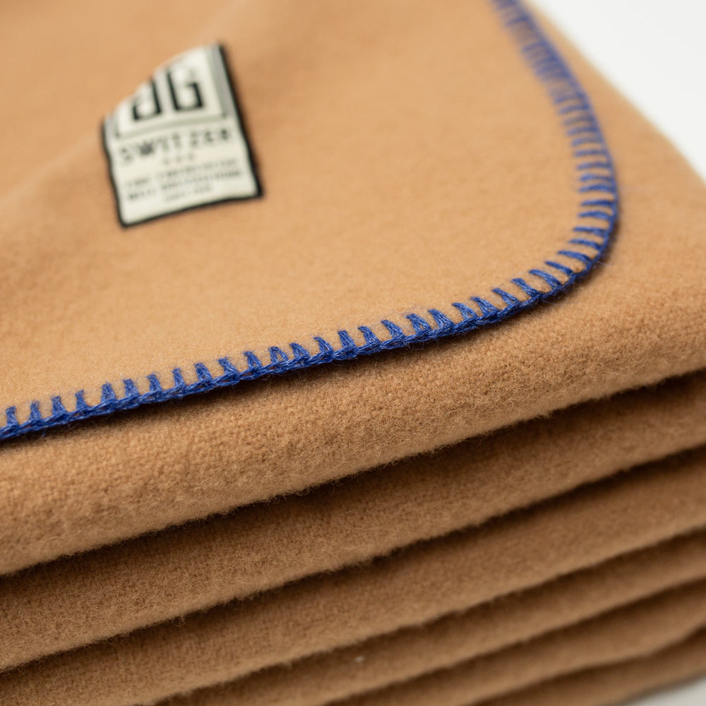 
                      
                        The Portia Throw - 100% Merino in Camel
                      
                    