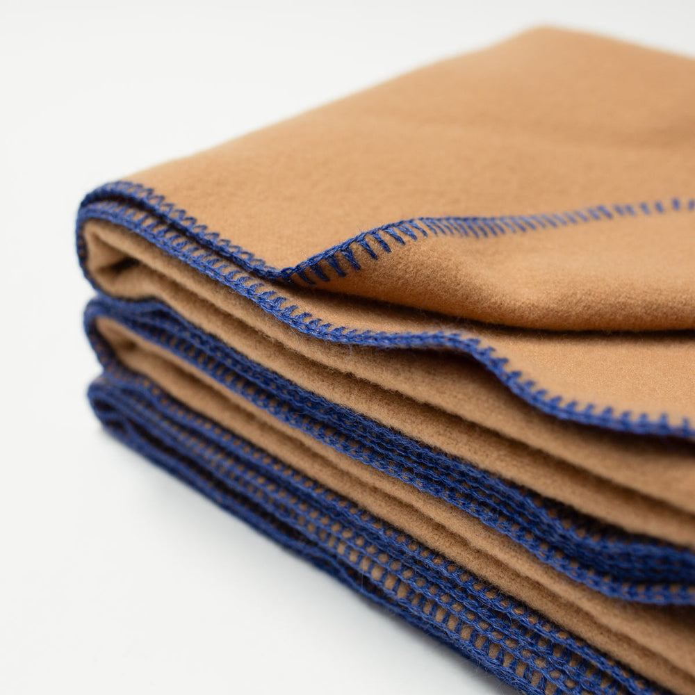 
                      
                        The Portia Throw - 100% Merino in Camel
                      
                    