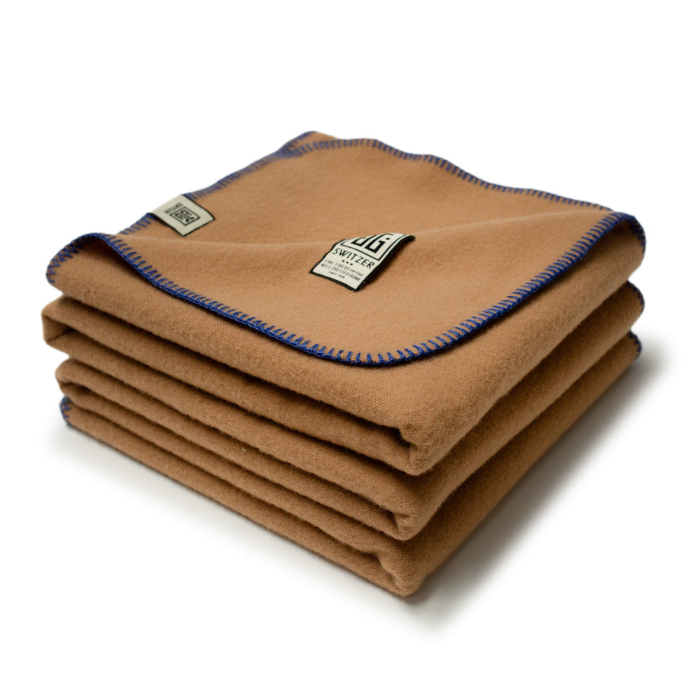 
                      
                        The JG Classic Blanket - 100% Merino in Camel
                      
                    