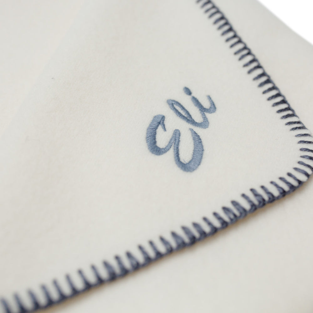 
                      
                        Baby Lambswool Blanket - White w/ Blue Stitch
                      
                    